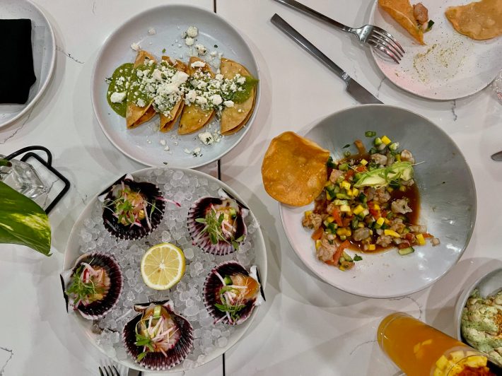 Scallop aguachile, ceviche marinero de camarón, and tacos de papa. Photo by Javier Cabral for L.A. TACO.