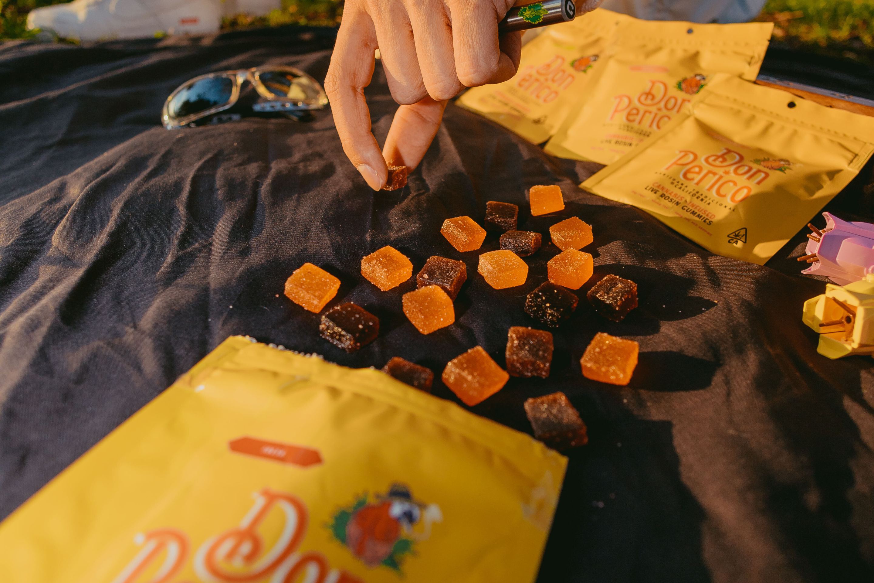 A blanket spread out with Don Perico gummies