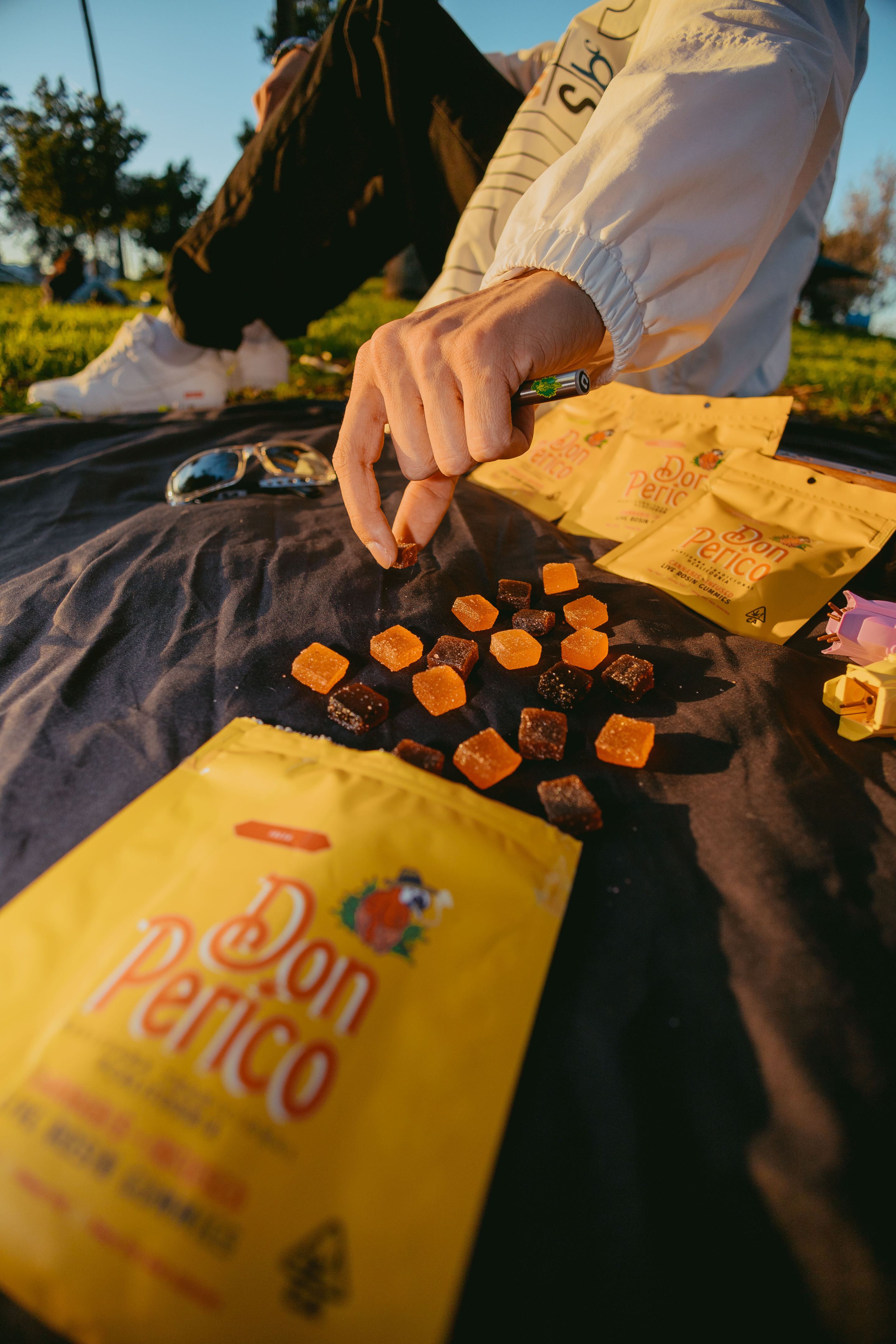 A blanket spread out with Don Perico gummies