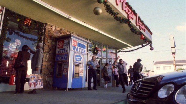 Craig and Dad-Day are chased through the plaza. Photo via New Line Cinema.