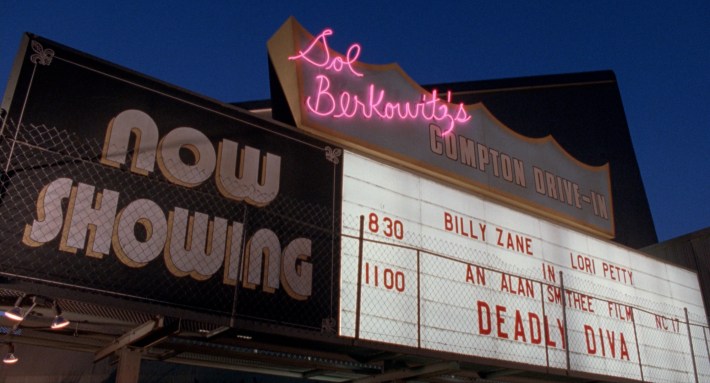 The Simi Drive-In sign redecorated to become the Compton Drive-In. Screenshot via Columbia Pictures.